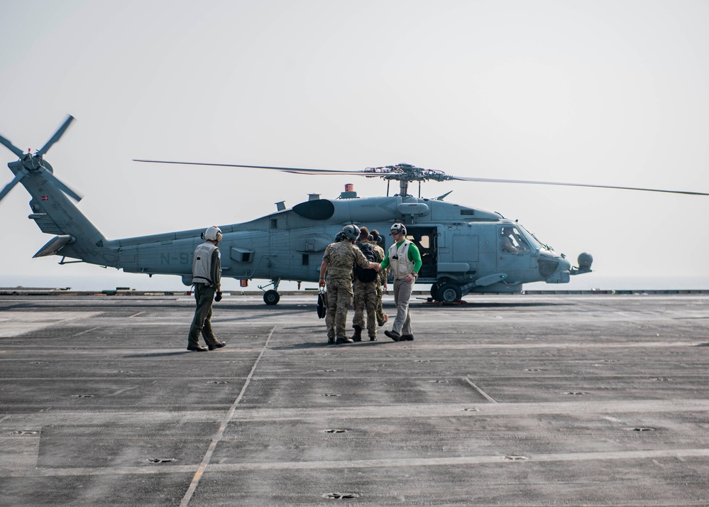 USS Dwight D. Eisenhower, Danish Navy HDMS Iver Huitfeldt Participate in a Sail Past in the Red Sea