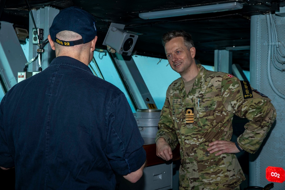 USS Dwight D. Eisenhower, Danish Navy HDMS Iver Huitfeldt Participate in a Sail Past in the Red Sea