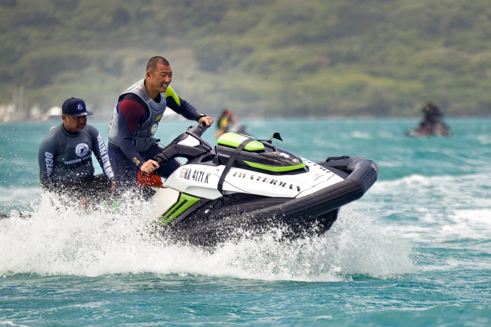 Train the Trainer; Lifeguards Riding the waves on Marine Corps Base Hawaii: Lifeguards from across the Pacific region participate in a Rescue Watercraft Risk Technician Course