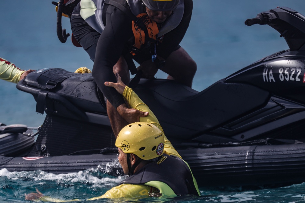 Train the Trainer; Lifeguards Riding the waves on Marine Corps Base Hawaii: Lifeguards from across the Pacific region participate in a Rescue Watercraft Risk Technician Course