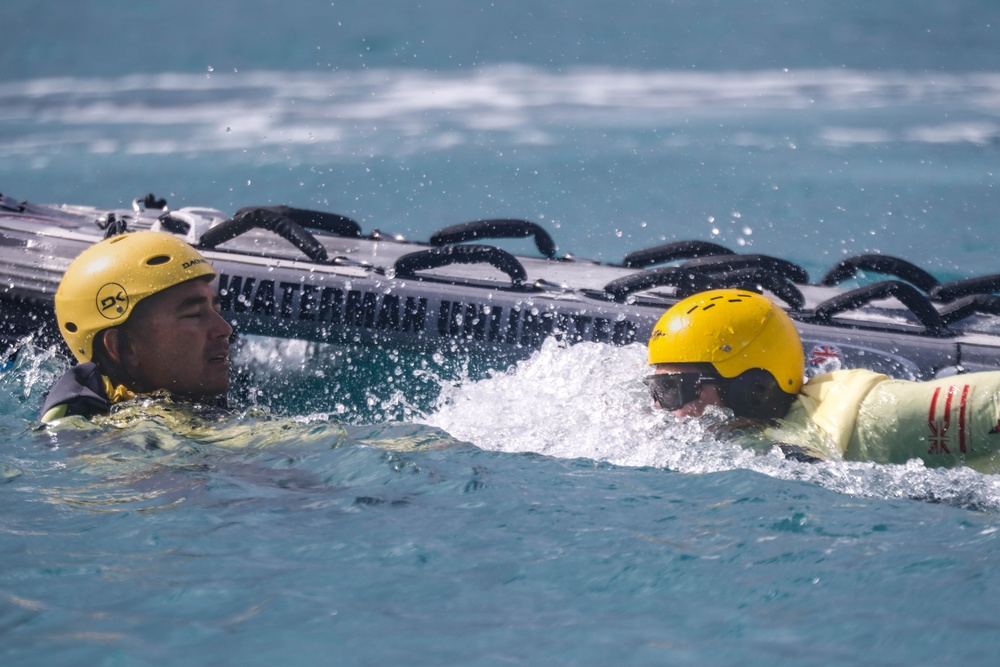Train the Trainer; Lifeguards Riding the waves on Marine Corps Base Hawaii: Lifeguards from across the Pacific region participate in a Rescue Watercraft Risk Technician Course