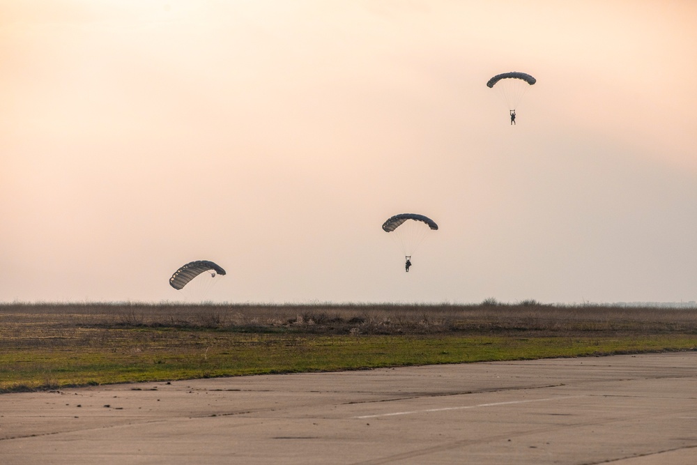 U.S. Army Green Berets perform freefall jump during Trojan Footprint 24