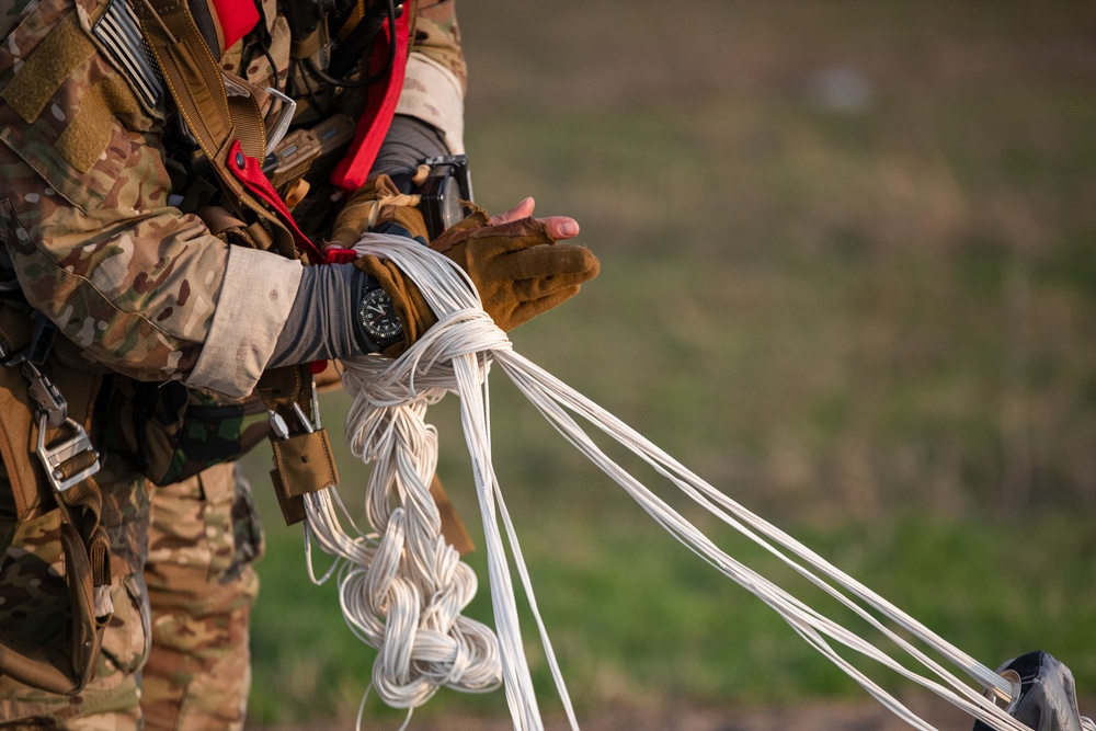 U.S. Army Green Berets perform freefall jump during Trojan Footprint 24