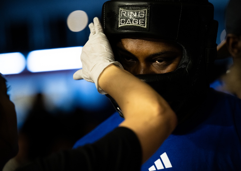 U.S. service members compete during Rumble in the Deid II boxing event