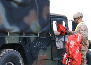 Motor Transport Operators get rare chance to drive over open water during JLOTS cross training exercise