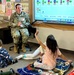 Munson Army Health Center team members help foster child literacy