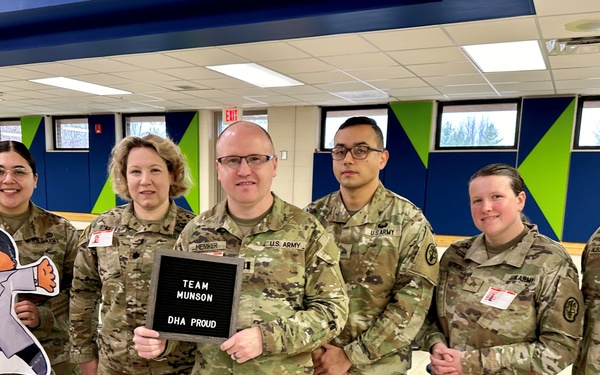 Munson Army Health Center team members help foster child literacy