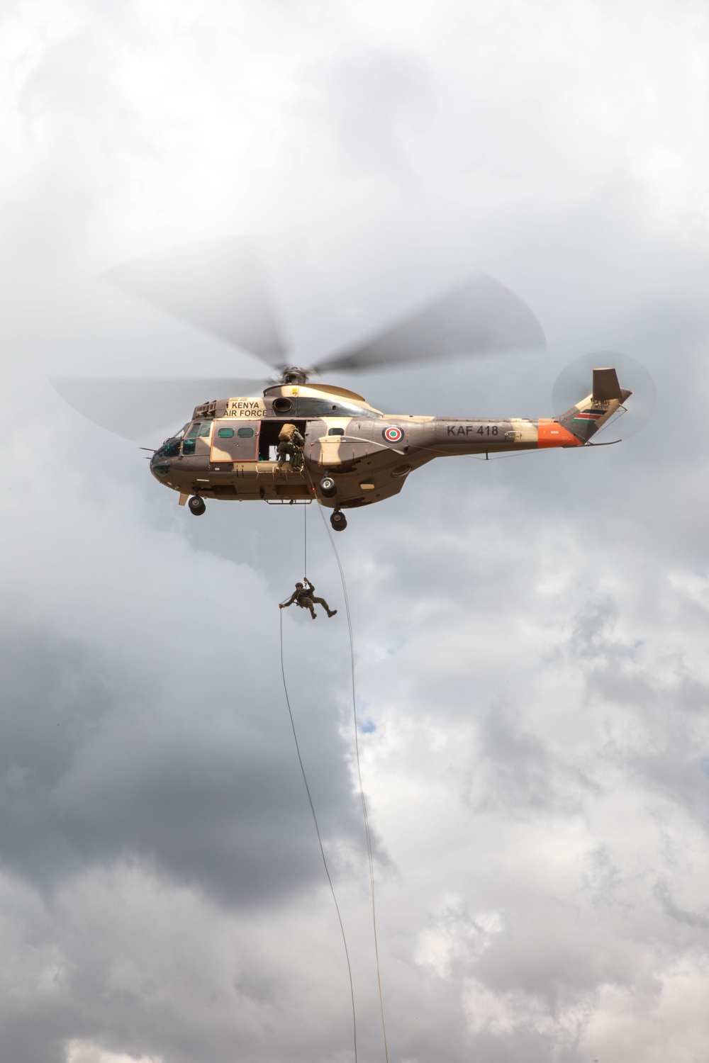 Kenya Defence Forces Rapid Response Unit rappel out of a Aérospatiale SA 330 Puma