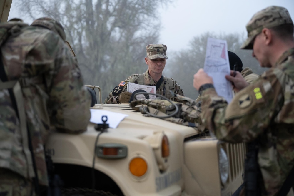 U.S. Army Reserve Soldiers complete land navigation during the Division Best Squad Competition