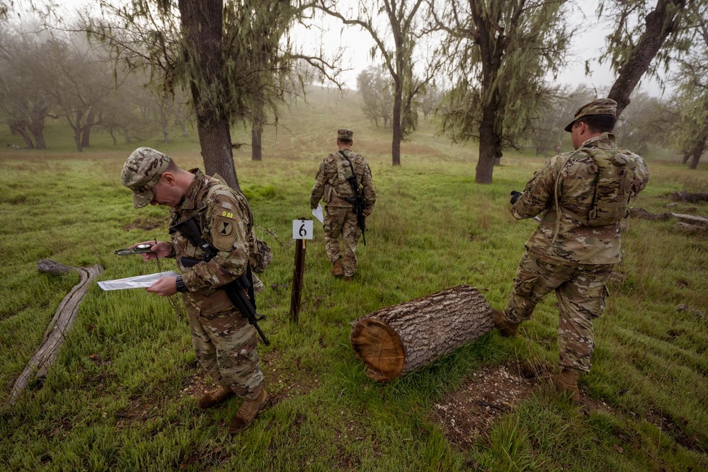 U.S. Army Reserve Soldiers complete land navigation during the Division Best Squad Competition