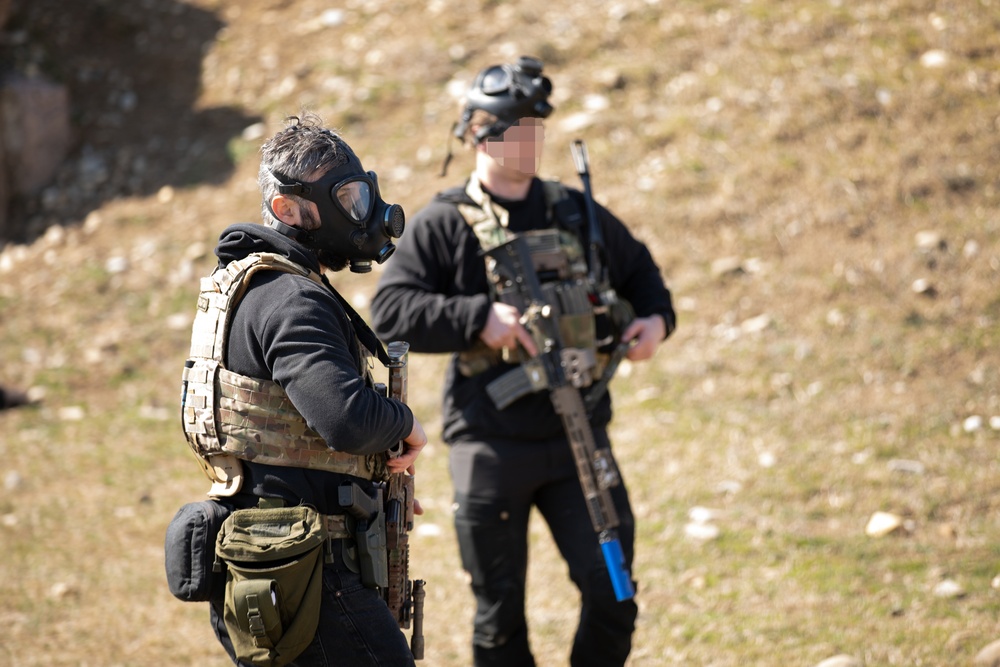 U.S. Green Berets work with Georgian special operations forces to secure a chemical weapons site during Trojan Footprint 24