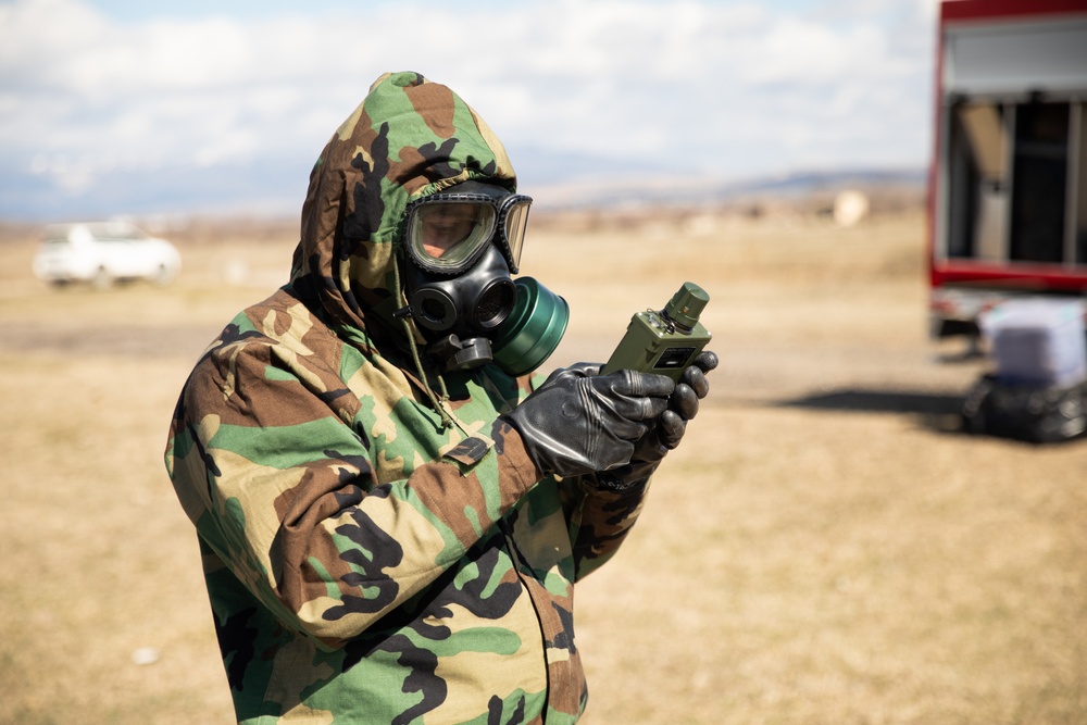 Georgian special operations forces soldiers test for chemical contamination at Trojan Footprint 24