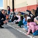 Muroc students watch Thunderbirds practice from Edwards' flight line