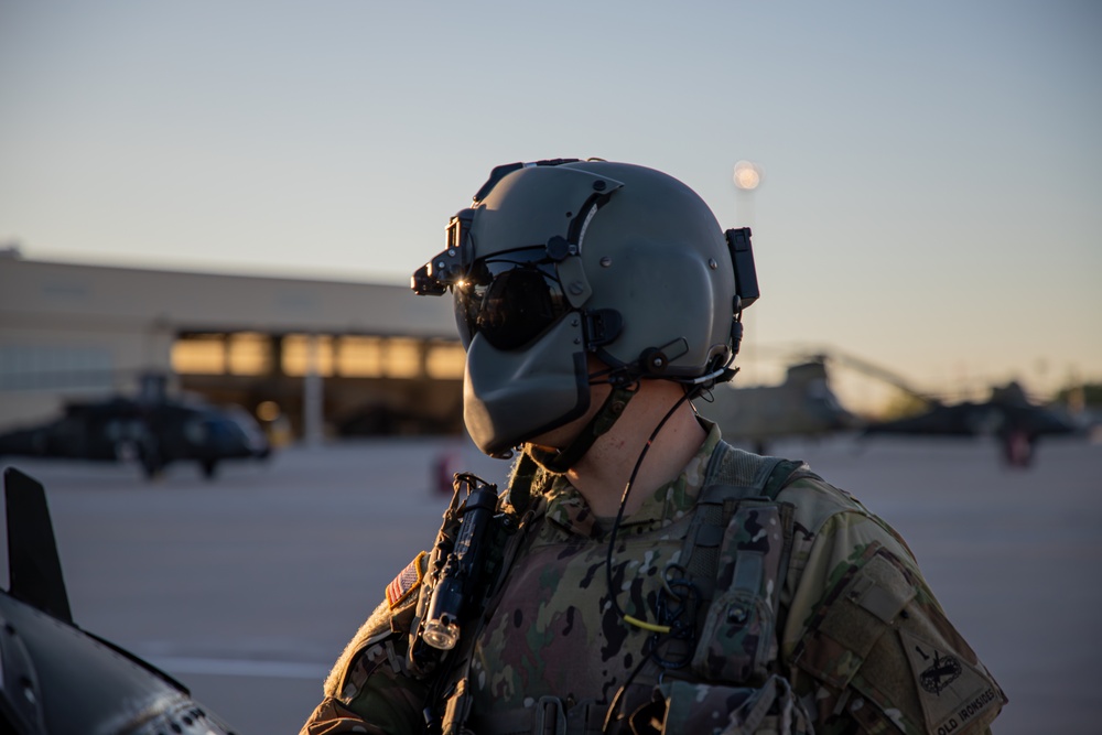 U.S. Army Door Gunner conduct pre-flight checks