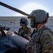 U.S. Army Door Gunners conduct pre-flight checks