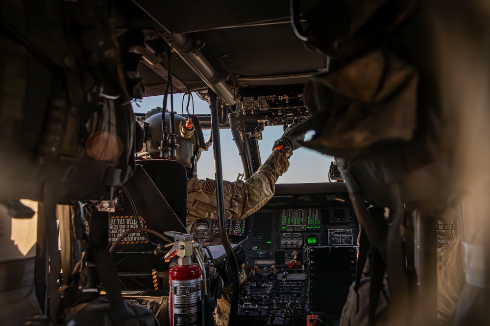 U.S. Army pilot conducts pre-flight checks