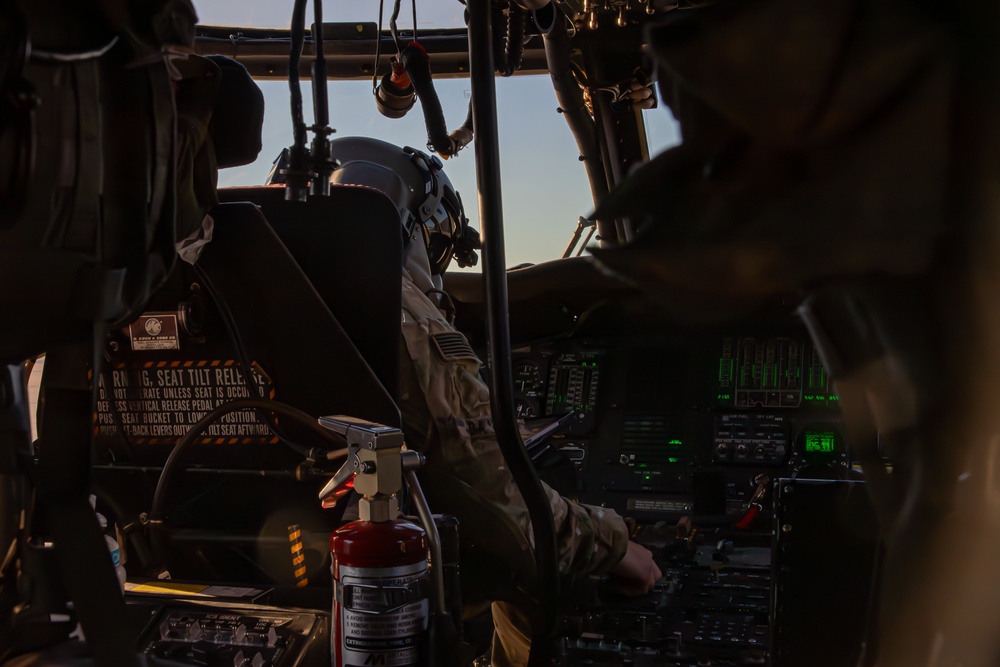 U.S. Army Pilot conducts pre-flight checks