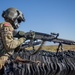 U.S. Army Door Gunner loads a M240B