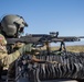 U.S. Army Door Gunner fires a M240B