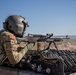 U.S. Army Door Gunner fires a M240B