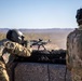 U.S. Army Door Gunner fires a M240H