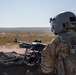 U.S. Army Pilot fires a M240H