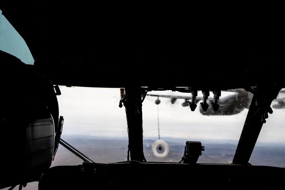 Air Force Combat King II refuels Marine Corps Super Stallion