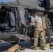 U.S. Army UH-60M Blackhawk crew conduct pre-flight checks