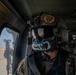 U.S. Army Door Gunner looks off into the distance