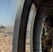 U.S. Army Door Gunner scans the desert