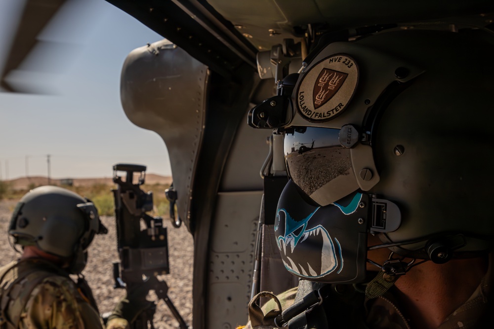 DVIDS - Images - U.S. Army Door Gunner looks off at UH-60M Blackhawk ...