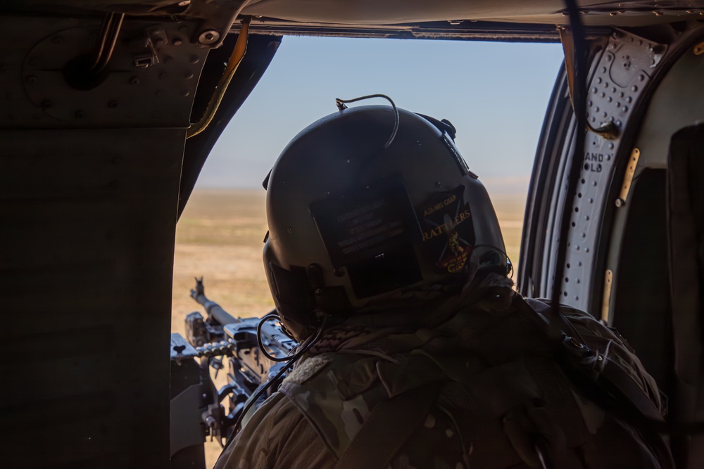 U.S. Army Crew Chief scans for a target