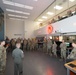 U.S. Air Force Capt. Justin Niquette, center right, 60 Air Mobility Wing Phoenix Spark Lab directorDepartment of the Air Force California Installation Commanders' Caucus attendees are briefed on Phoenix Spark lab capabilities.