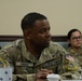 U.S. Air Force Chief Master Sgt. Johnny Harris listens to a briefing during the Department of the Air Force California Installation Commanders' Caucus