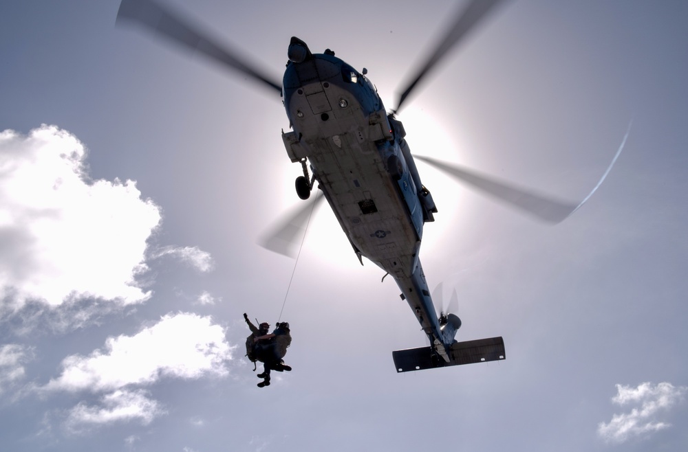 U.S. Navy's Helicopter Sea Combat Squadron 25 medevacs crewmember from USCGC Polar Star