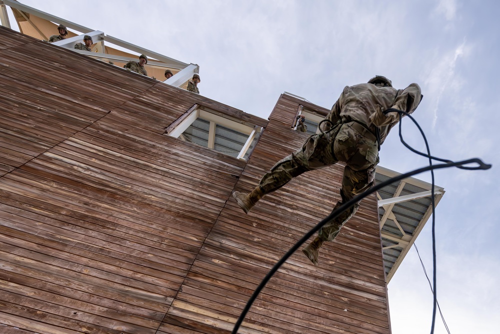 63rd Readiness Divisions Soldiers complete repel tower during the Division Best Squad Competition