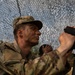 Pvt. Bray waits observes mortar rounds on hills