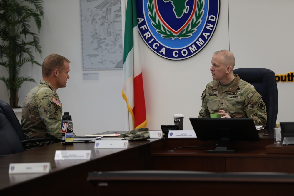 Col. Daniel Cederman meets with Brig. Gen. Brian Cashman