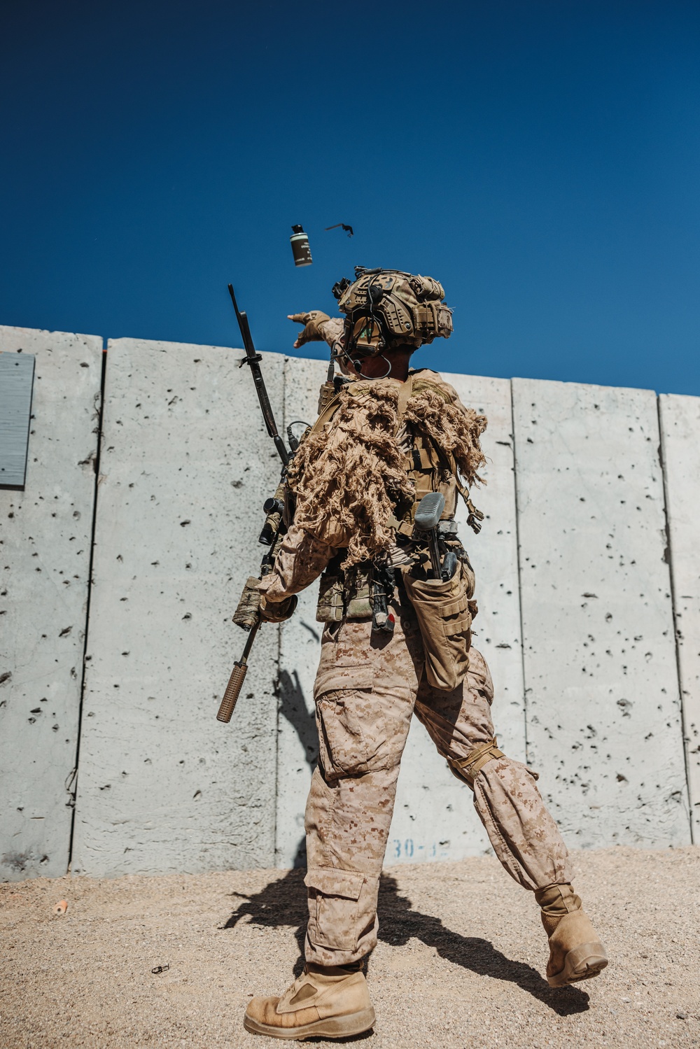 Marines with V26 conduct a platoon attack at Range 205 while participating in SLTE 2-24