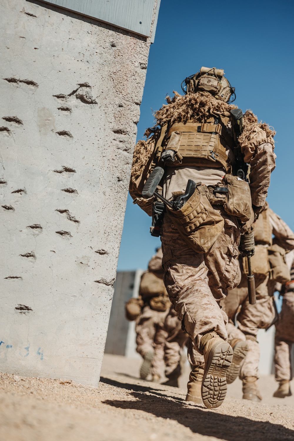 Marines with V26 conduct a platoon attack at Range 205 while participating in SLTE 2-24