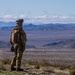 U.S. Army Soldier overlooks mountain range during NTC 24-04