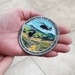 New Fort Hunter Liggett Challenge Coin reflects the military mission while depicting the beauty of nature
