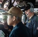 USS Russell (DDG 59) refuels alongside USS Theodore Roosevelt (CVN 71)