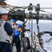 USS Russell (DDG 59) refuels alongside USS Theodore Roosevelt (CVN 71)