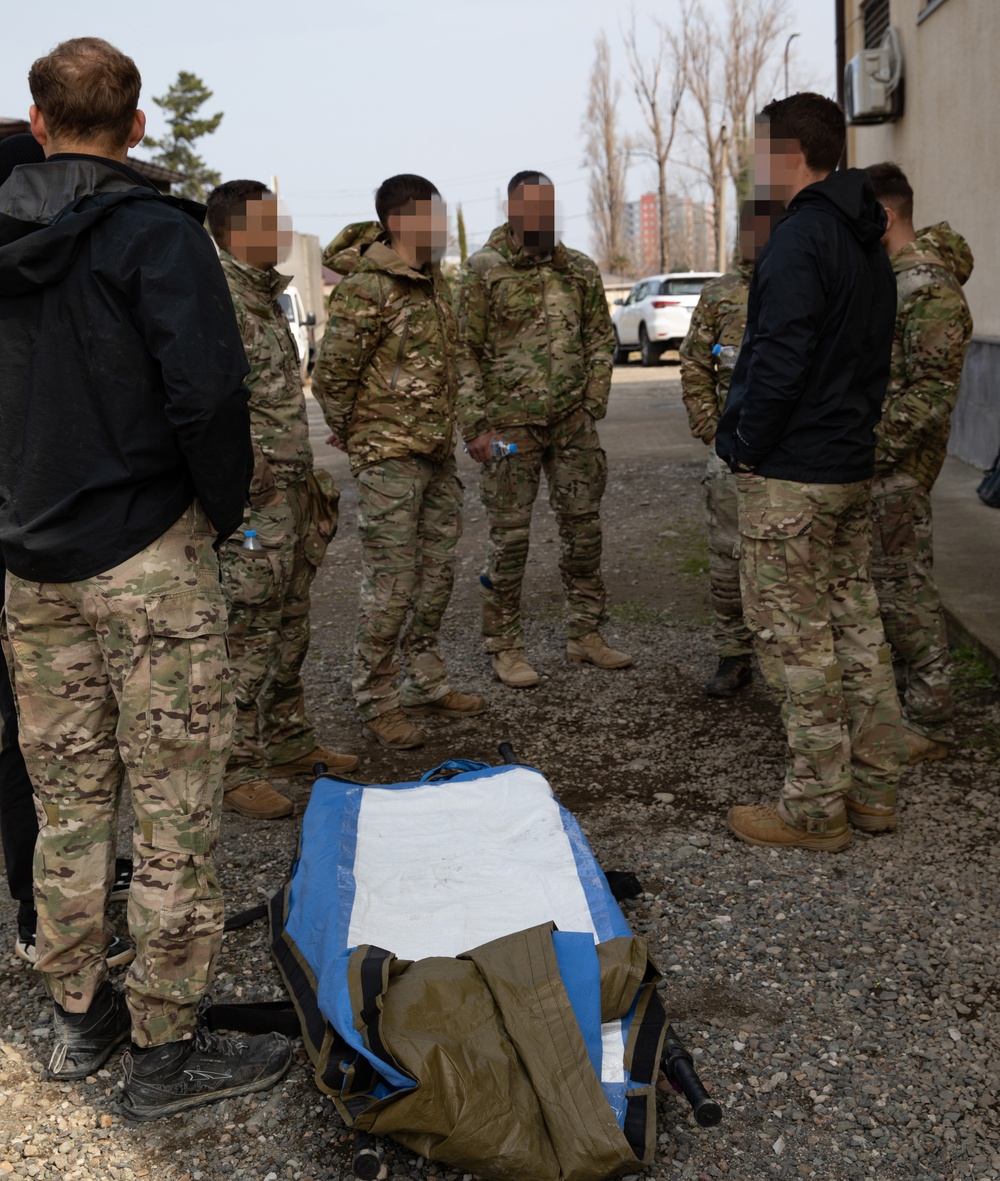 Romanian special operations forces soldiers conduct tactical combat casualty care with MARSOC Marines at Trojan Footprint 24