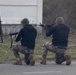 Georgian guard and Georgian special operations forces soldiers act as opposing forces during an STX with MARSOC Marines