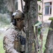 A Spanish special operations forces soldier waits patiently to clear a compound during Trojan Footprint 24