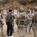 U.S. MARSOC Marine Raiders instruct Georgian, and Spanish special operations forces soldiers on 15 meter pistol engagements during Trojan Footprint 24