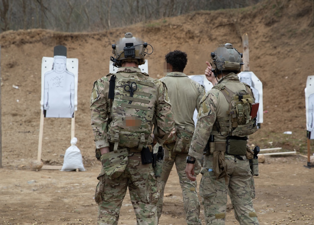 U.S. MARSOC Marine Raiders instruct Georgian, and Spanish special operations forces soldiers on 25 meter rifle engagements during Trojan Footprint 24