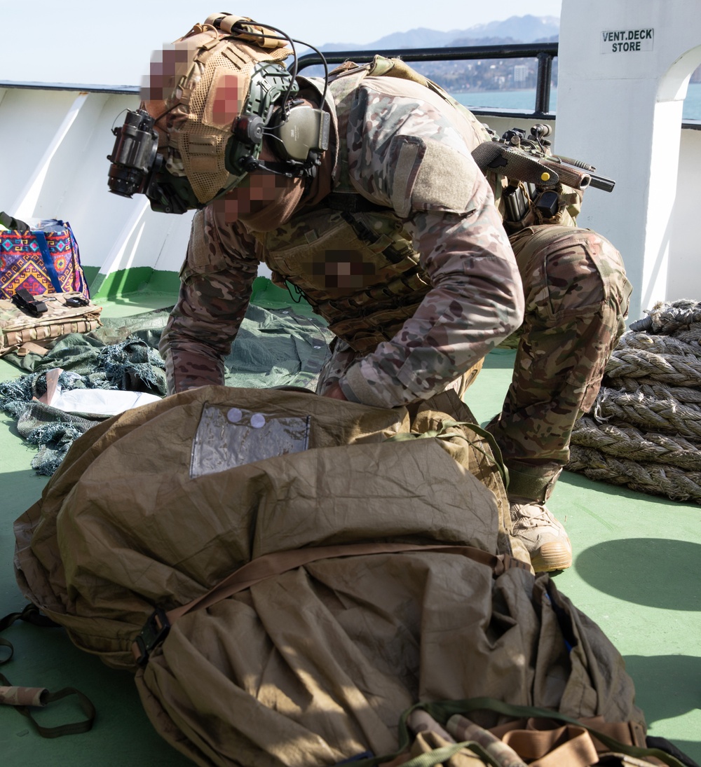 Georgian and Spanish special operations forces soldiers conduct tactical combat casualty care with U.S. MARSOC Marines during Trojan Footprint 24